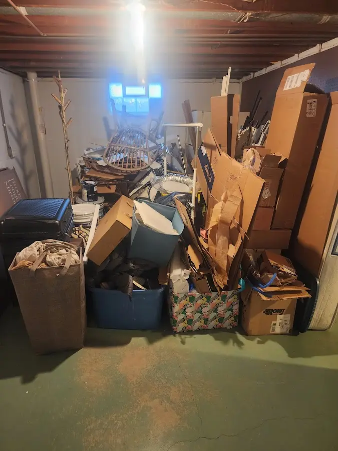 Roll-off dumpster container at job site for Yard Waste Dumpster Rental in Evans